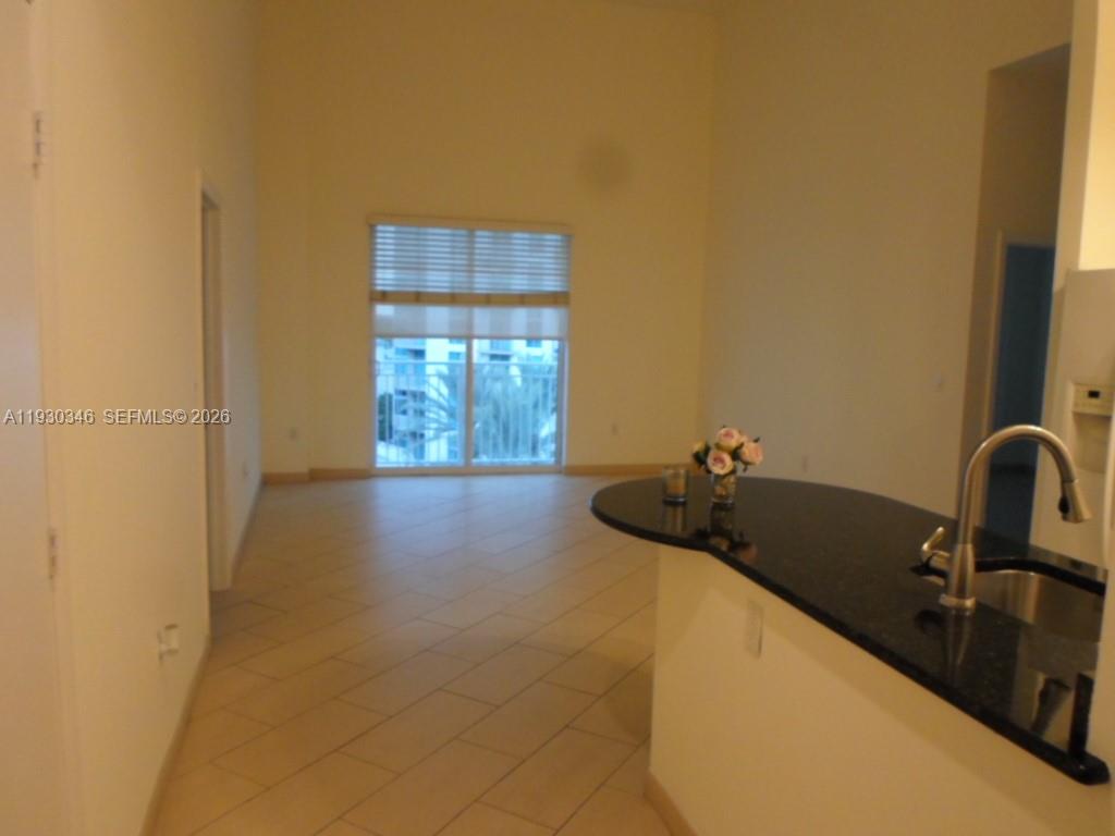 7275 Southwest 90th Way, Unit G 611 Miami, FL 33156 - Photo 26 of 56 a bathroom with a sink and a bathtub