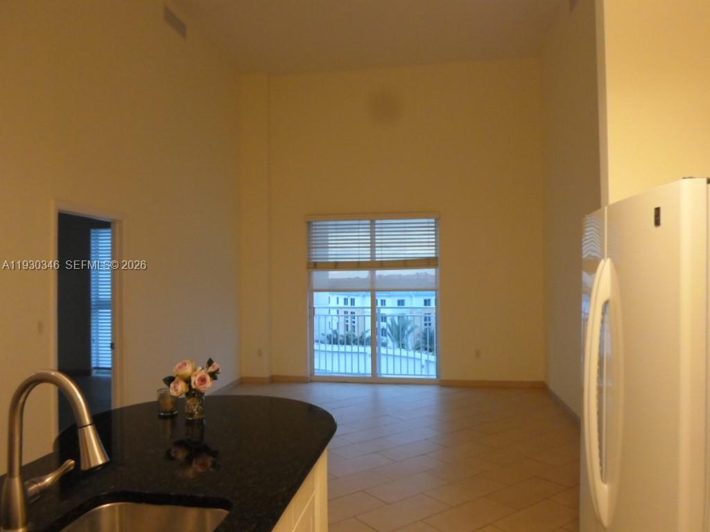 7275 Southwest 90th Way, Unit G 611 Miami, FL 33156 - Photo 38 of 56 a view of a workspace with a window