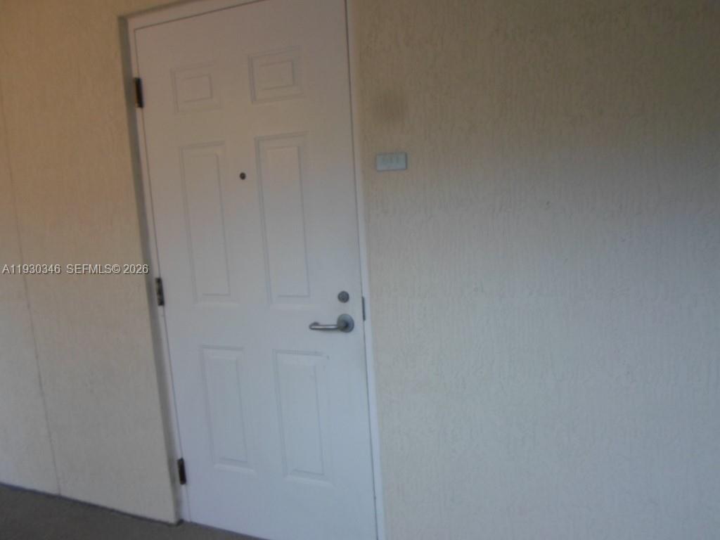 7275 Southwest 90th Way, Unit G 611 Miami, FL 33156 - Photo 49 of 56 a view of a hallway