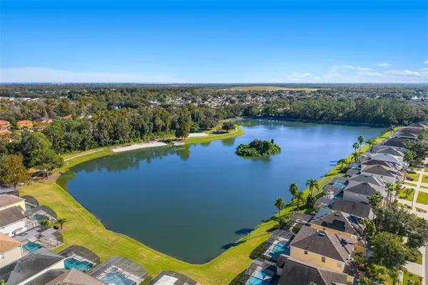 a view of a lake with a yard