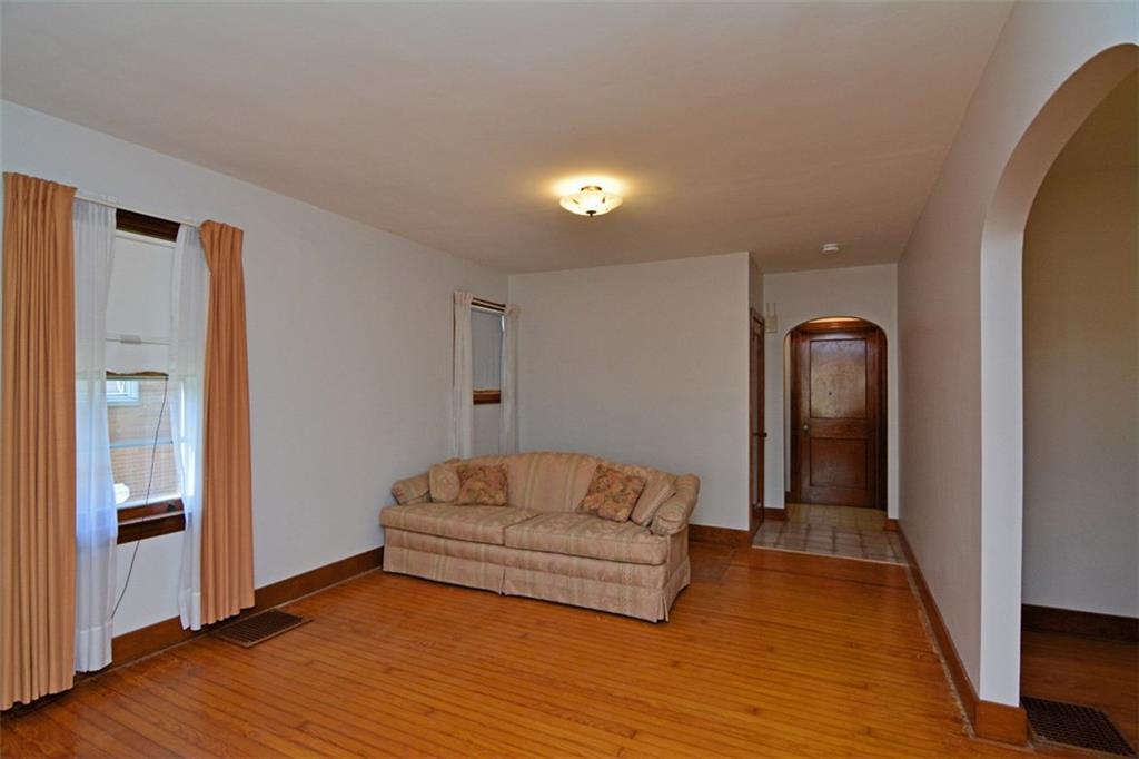 6902 Shannon Road Verona, PA 15147 - Photo 3 of 15 The living room also offers a nearby powder room (not pictured).