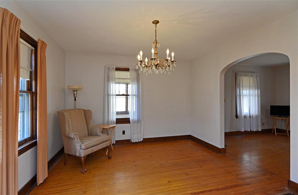 6902 Shannon Road Verona, PA 15147 - Photo 6 of 15 The formal dining room is situated conveniently between the kitchen and living room.