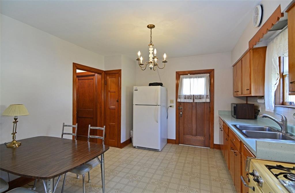 6902 Shannon Road Verona, PA 15147 - Photo 7 of 15 The large eat-in kitchen includes all appliances and offers a convenient walkout to the rear porch and yard.
