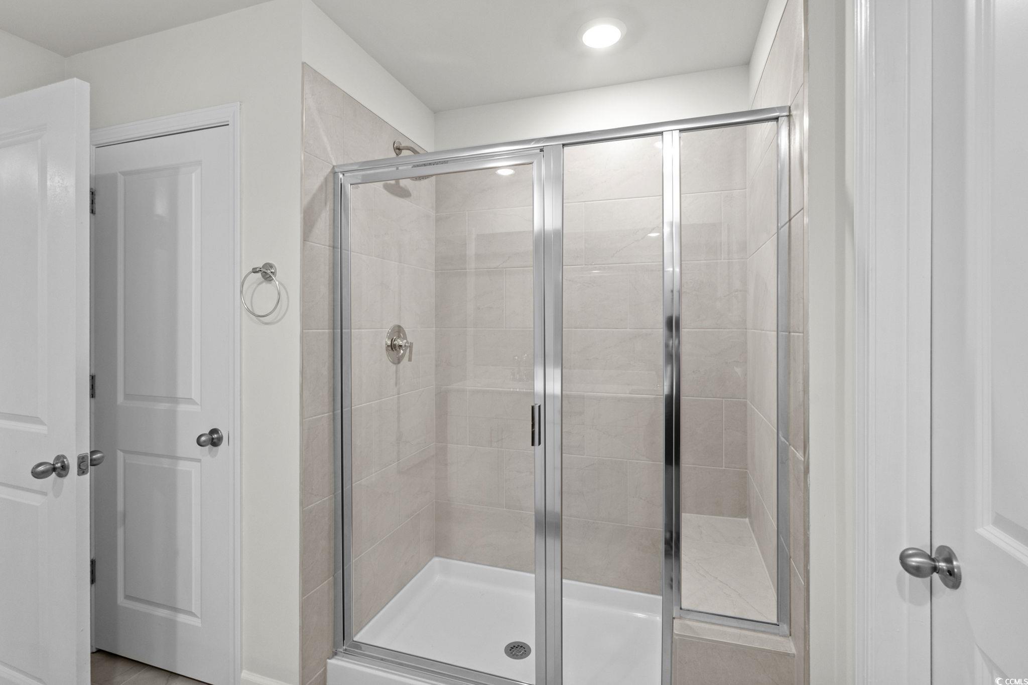 2409 Copper Crk Loop Longs, SC 29568 - Photo 14 of 40 Full bathroom with a shower stall