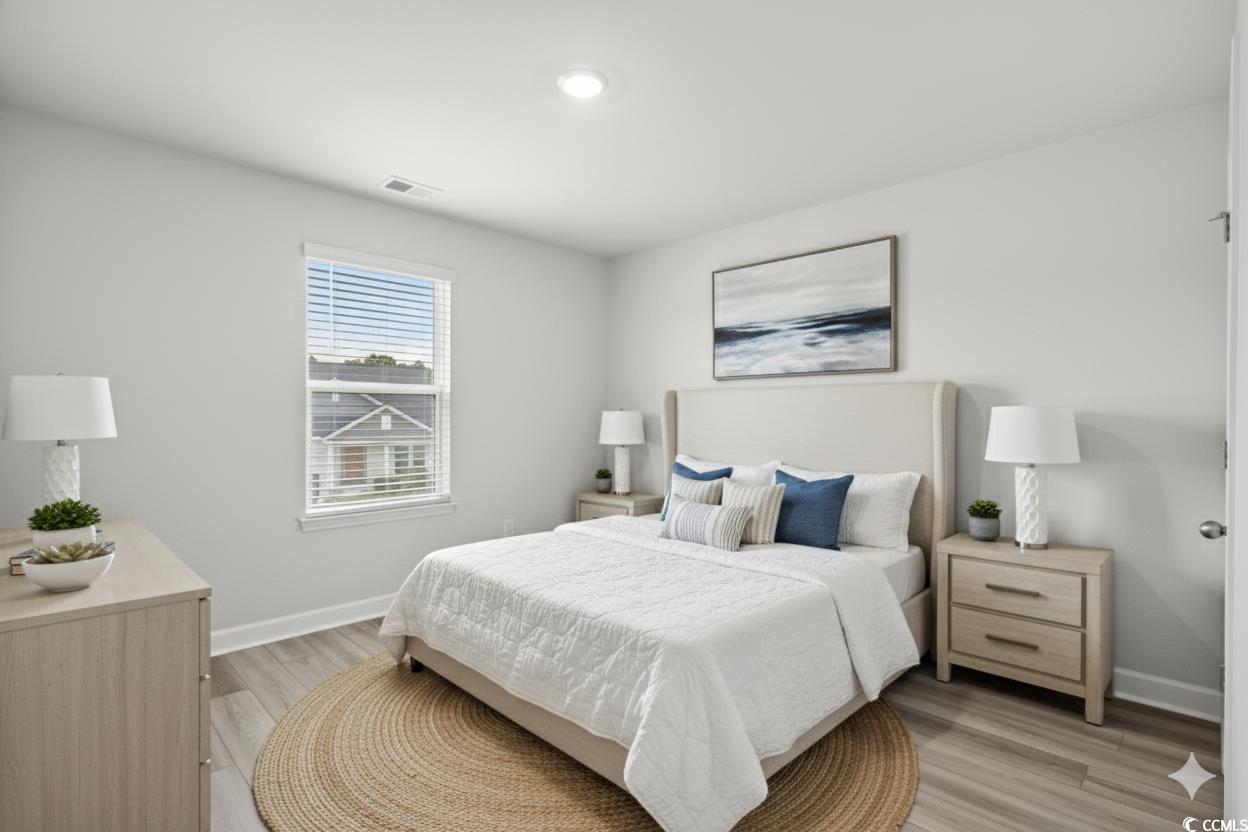 2409 Copper Crk Loop Longs, SC 29568 - Photo 16 of 40 Virtually Staged - Bedroom with baseboards and light wood finished floors