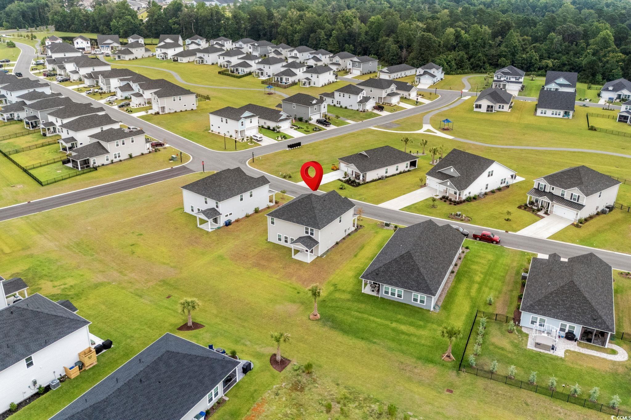 2409 Copper Crk Loop Longs, SC 29568 - Photo 24 of 40 Aerial perspective of suburban area