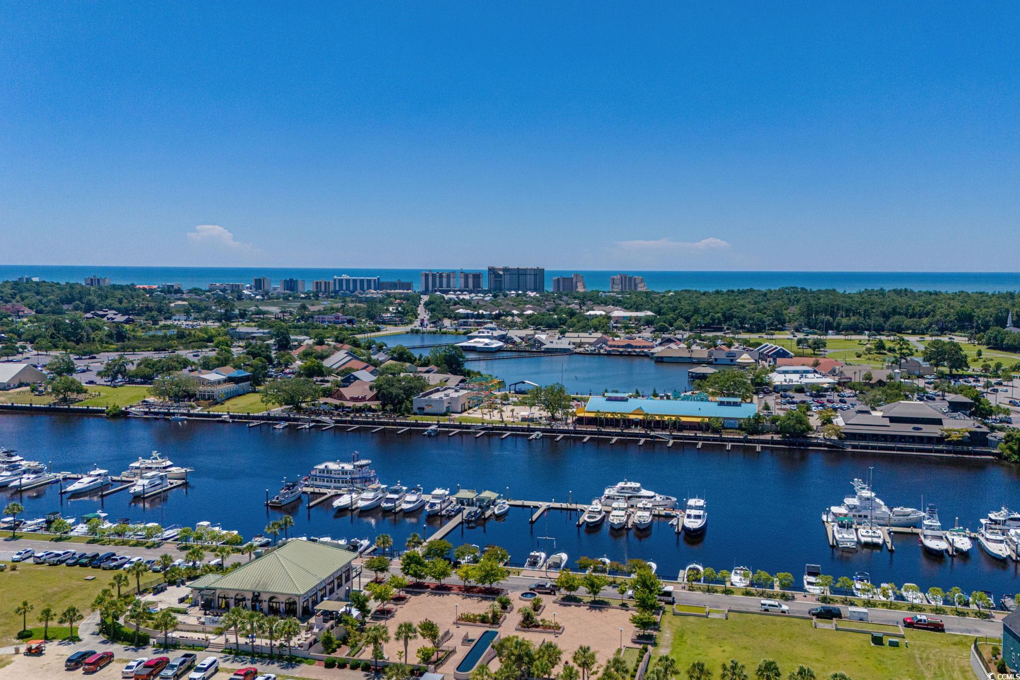 2409 Copper Crk Loop Longs, SC 29568 - Photo 37 of 40 Drone / aerial view of a marina