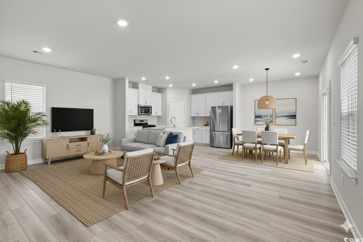 2409 Copper Crk Loop Longs, SC 29568 - Photo 8 of 40 Virtually Staged - Living area with recessed lighting and light wood-style floors