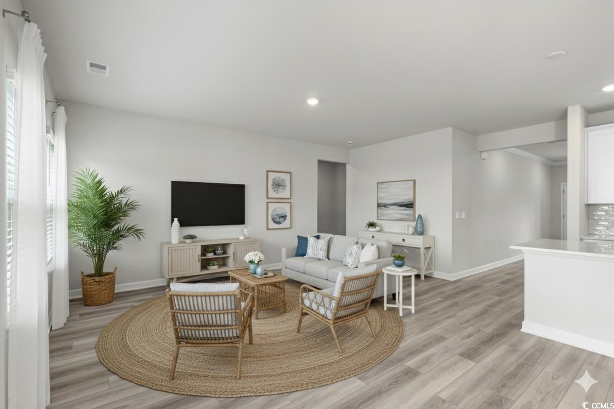2409 Copper Crk Loop Longs, SC 29568 - Photo 10 of 40 Virtually Staged - Living room with light wood-style flooring and recessed lighting