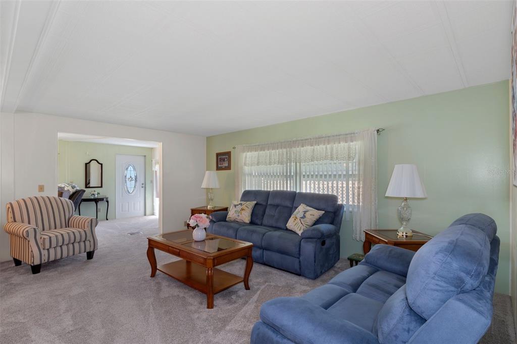 14751 Brookridge Boulevard Brooksville, FL 34613 - Photo 11 of 61 a living room with furniture