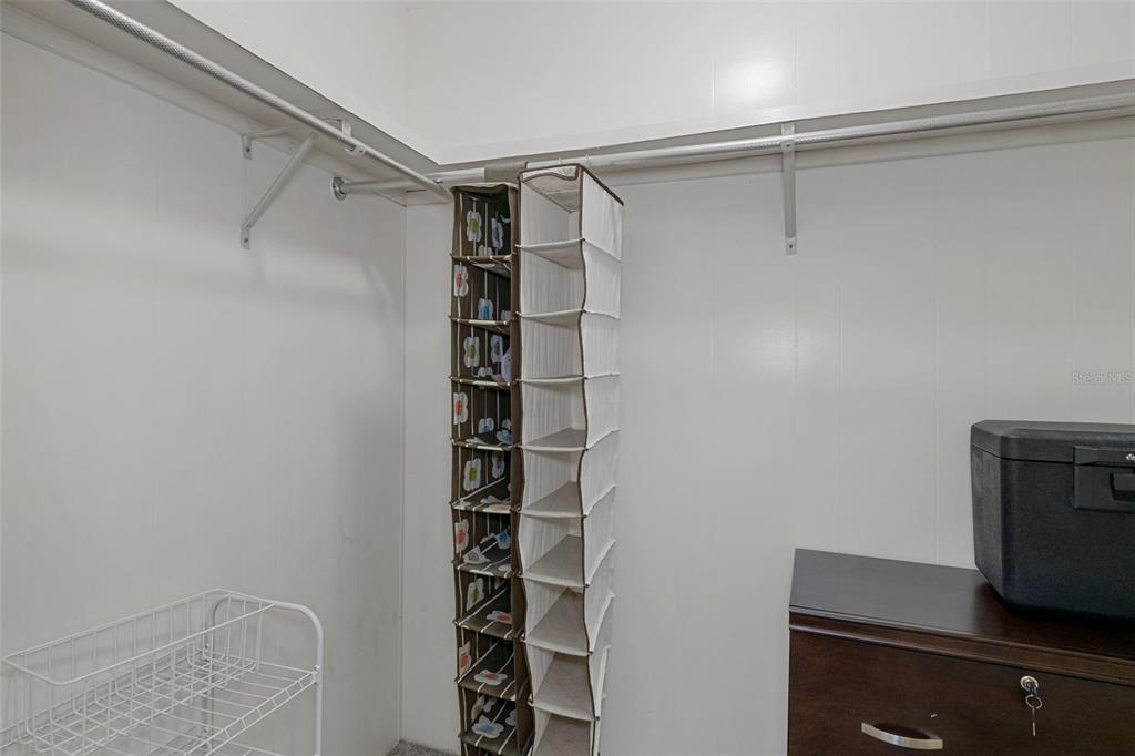 14751 Brookridge Boulevard Brooksville, FL 34613 - Photo 28 of 61 a view of walk in closet with empty racks