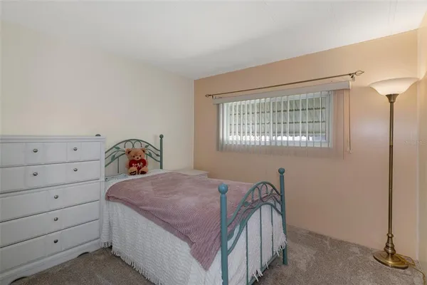 a balcony with chairs and table