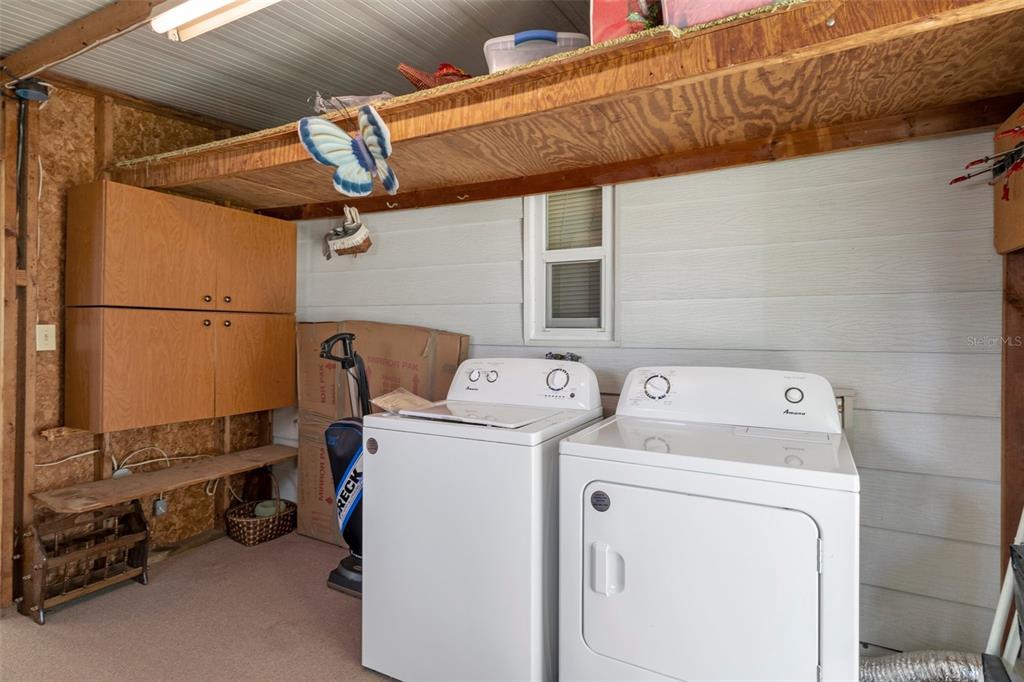 14751 Brookridge Boulevard Brooksville, FL 34613 - Photo 32 of 61 a utility room with dryer and washer
