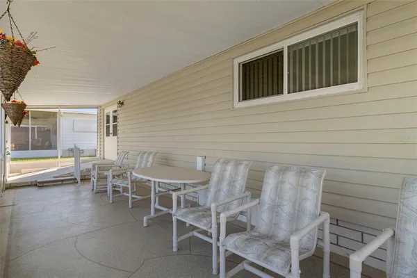 a view of a lake with a house in the background
