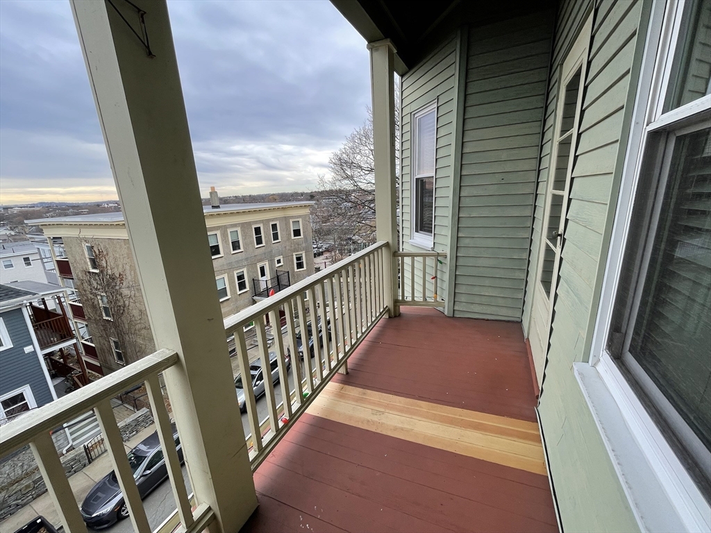 62 Ibbetson Street, Unit 3L Somerville, MA 02143 - Photo 3 of 20 a view of balcony with wooden floor