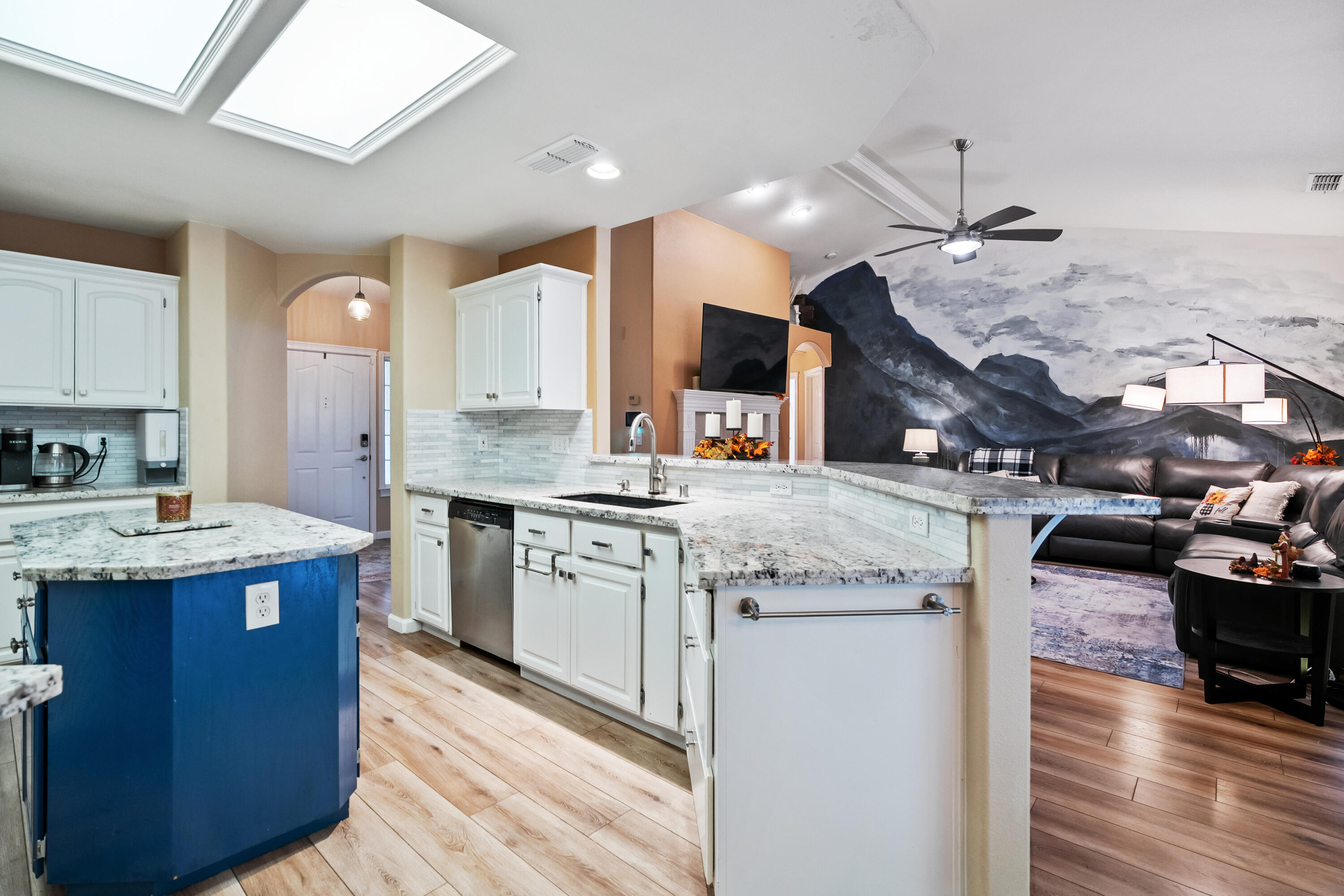19219 Nike Court Redding, CA 96003 - Photo 11 of 37 a kitchen with stainless steel appliances granite countertop a sink stove and cabinets