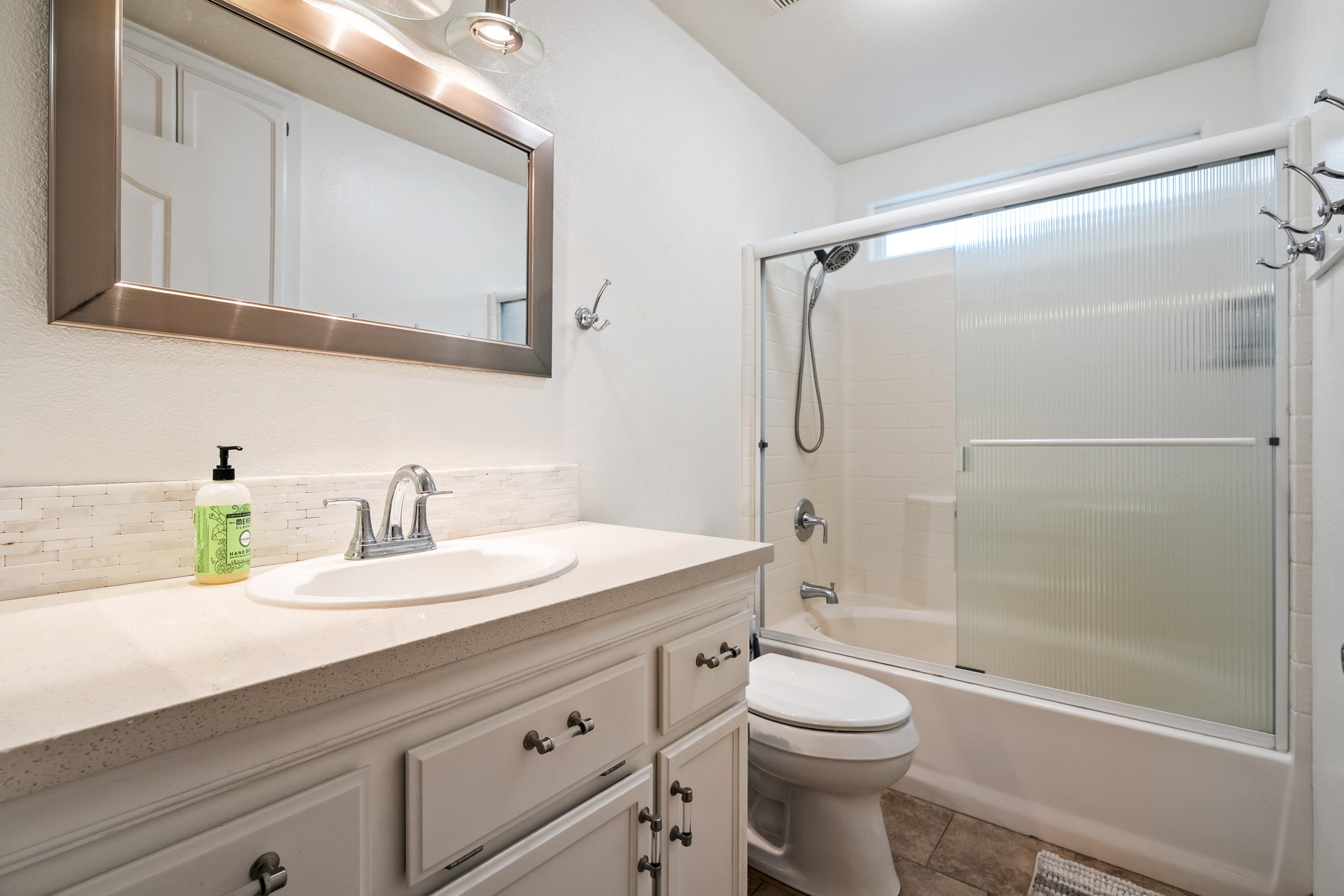 19219 Nike Court Redding, CA 96003 - Photo 15 of 37 a bathroom with a sink a toilet and shower