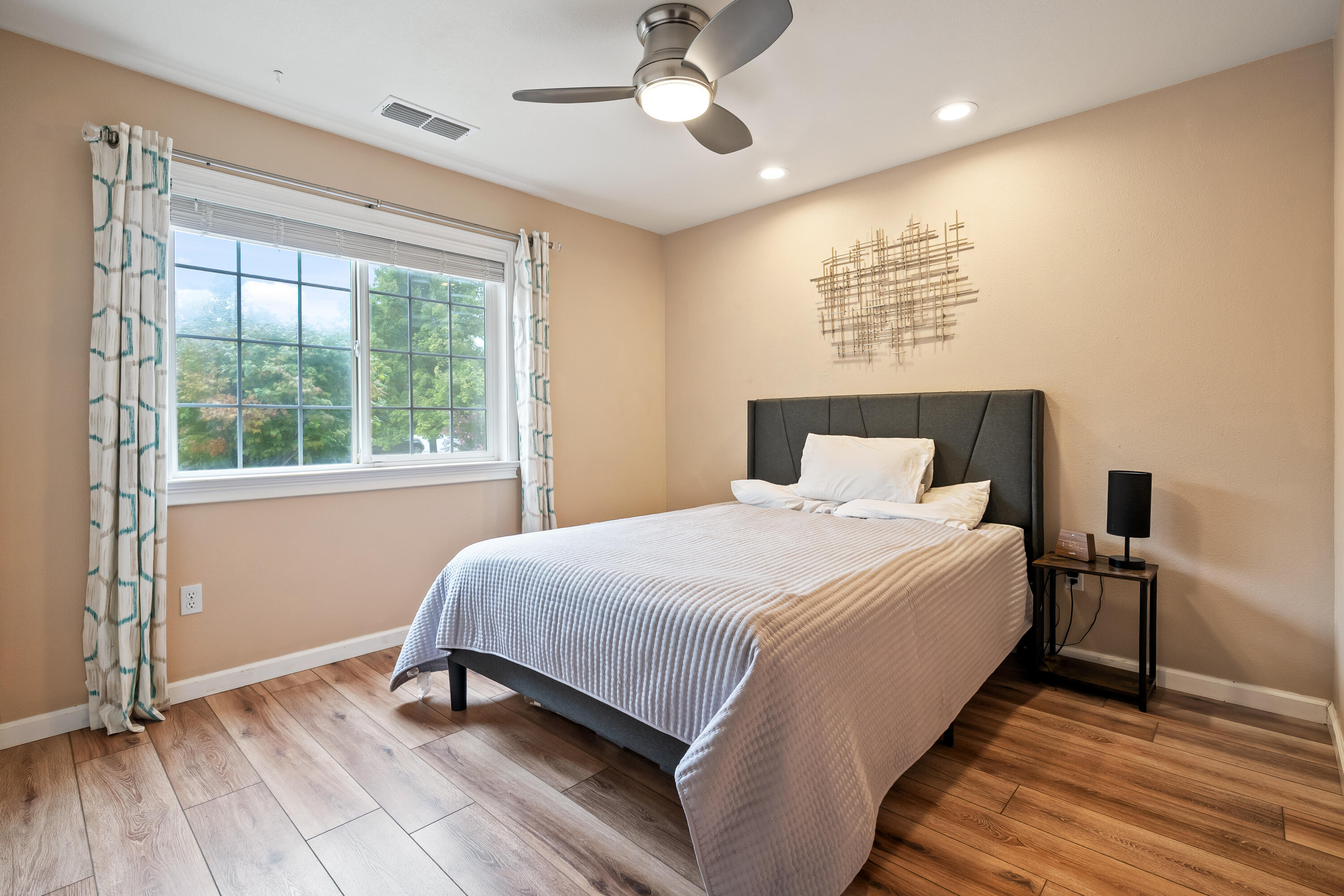 19219 Nike Court Redding, CA 96003 - Photo 17 of 37 a bedroom with a bed and a window