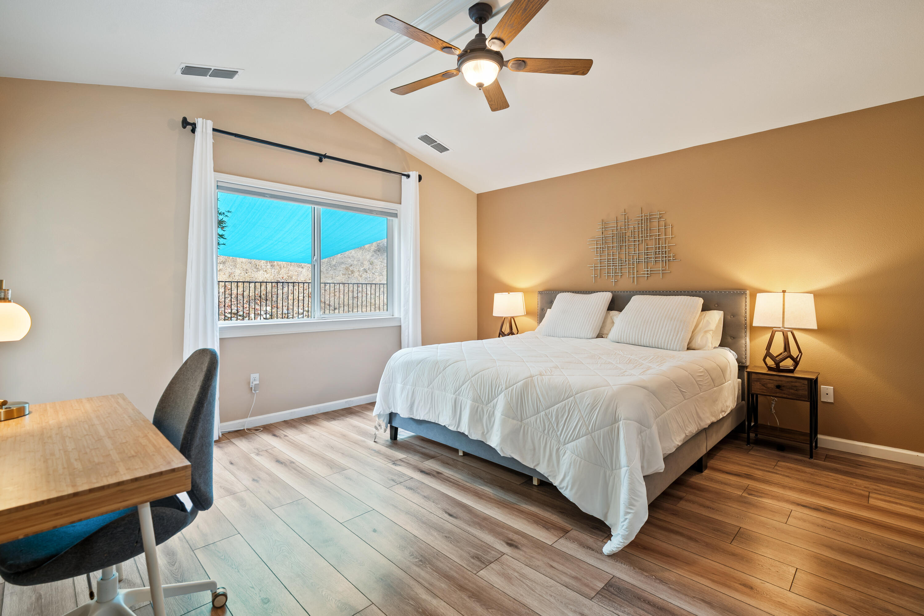 19219 Nike Court Redding, CA 96003 - Photo 18 of 37 a bedroom with a bed and wooden floor