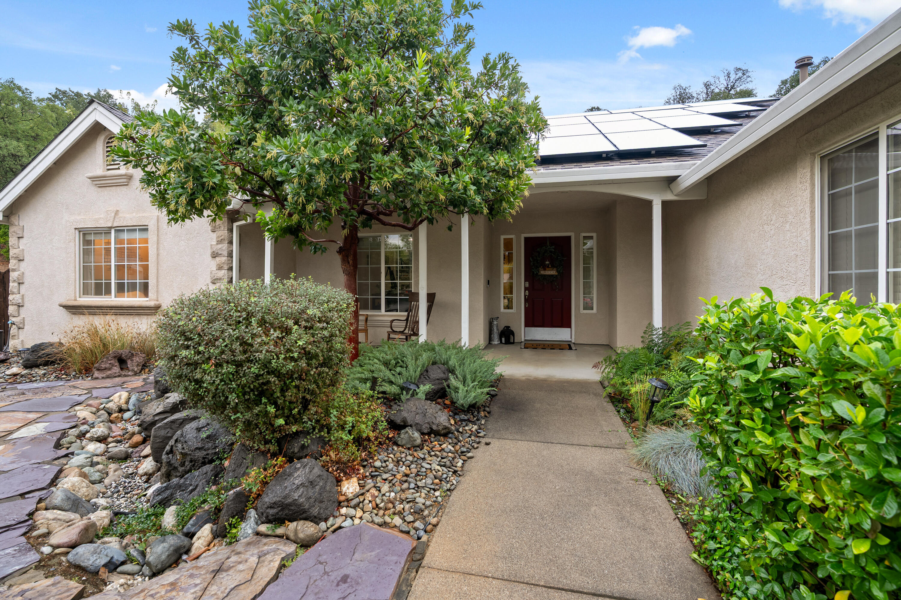 19219 Nike Court Redding, CA 96003 - Photo 2 of 37 front view of a house with a yard