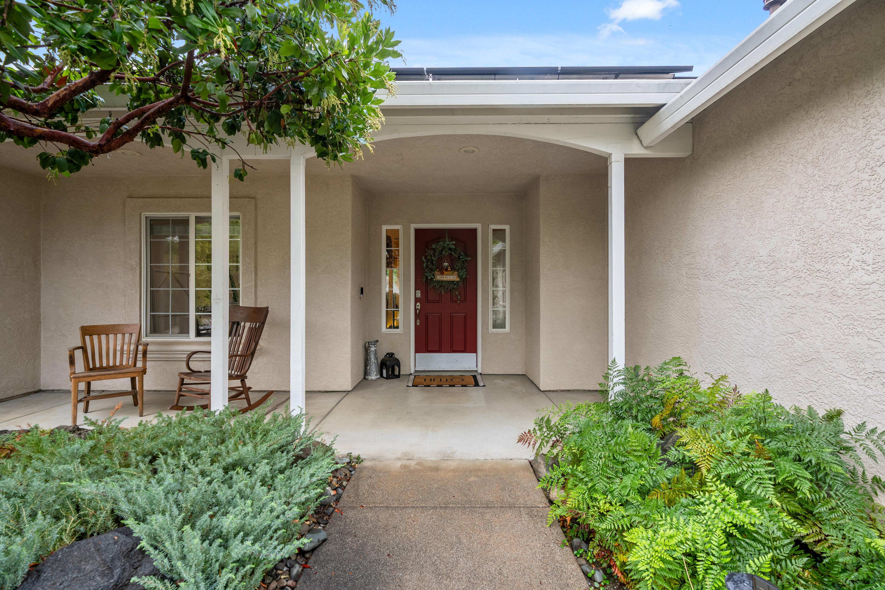 19219 Nike Court Redding, CA 96003 - Photo 3 of 37 front view of a house with a yard