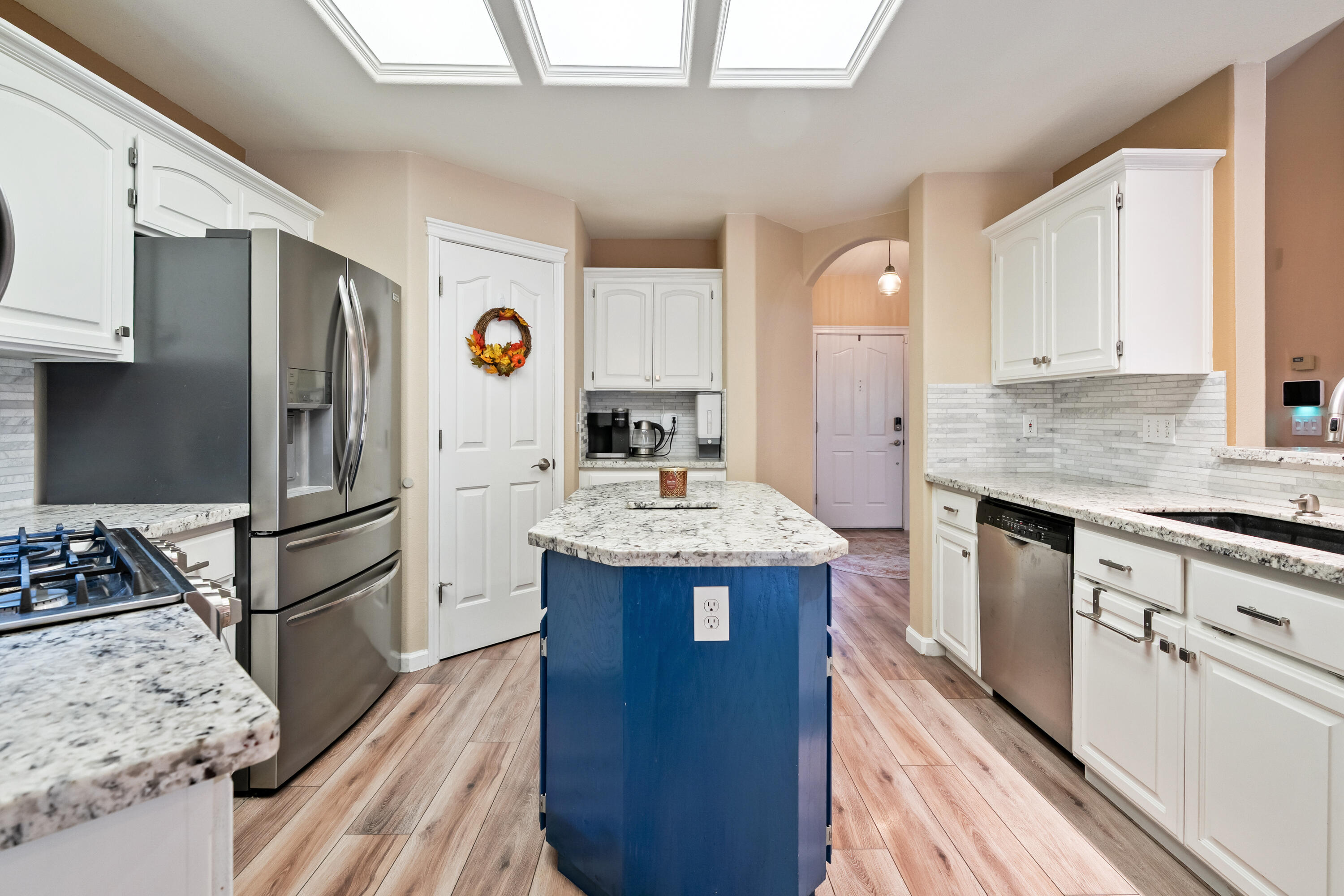 19219 Nike Court Redding, CA 96003 - Photo 5 of 37 a kitchen with stainless steel appliances granite countertop a sink stove and refrigerator