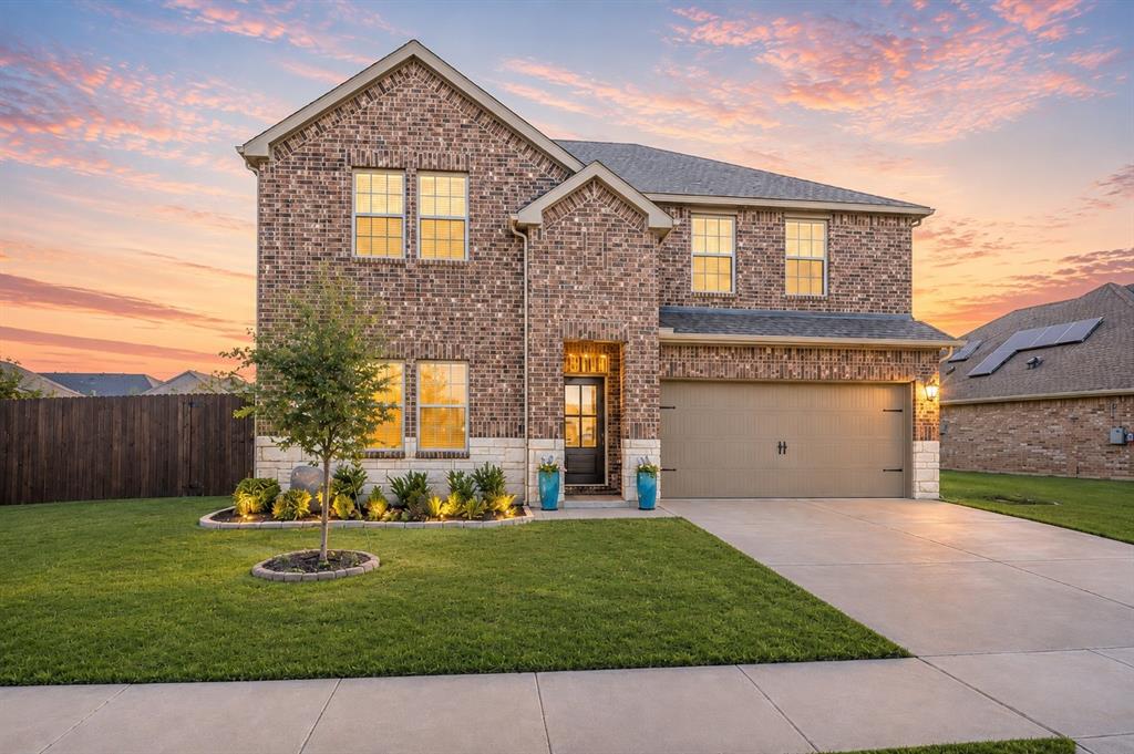 9828 Quail Pointe Road Aubrey, TX 76227 - Photo 1 of 23 Brick and stone exterior with a prominent two-car garage