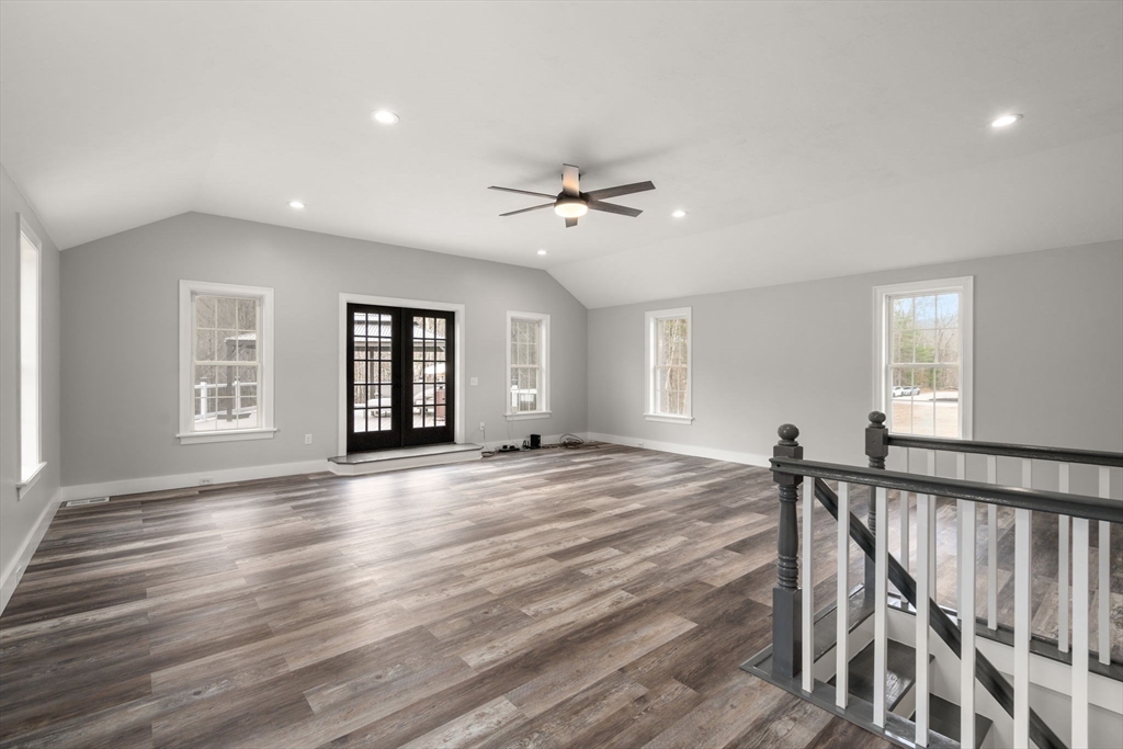 2 Britlees Way Dudley, MA 01571 - Photo 13 of 40 a view of empty room with wooden floor and fan