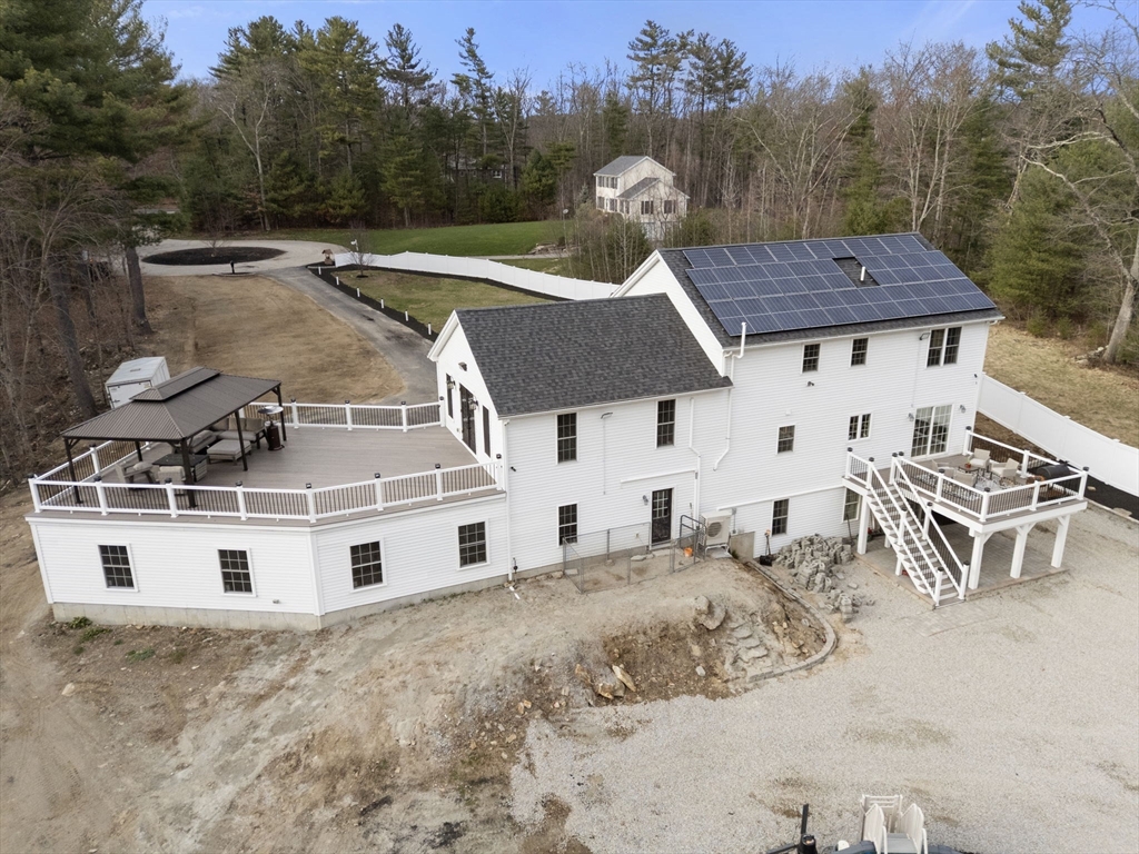 2 Britlees Way Dudley, MA 01571 - Photo 32 of 40 a view of a house with a yard