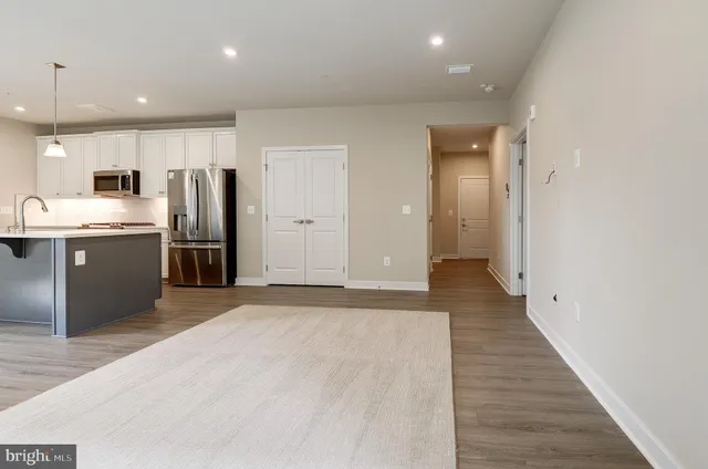 a view of a kitchen with a sink