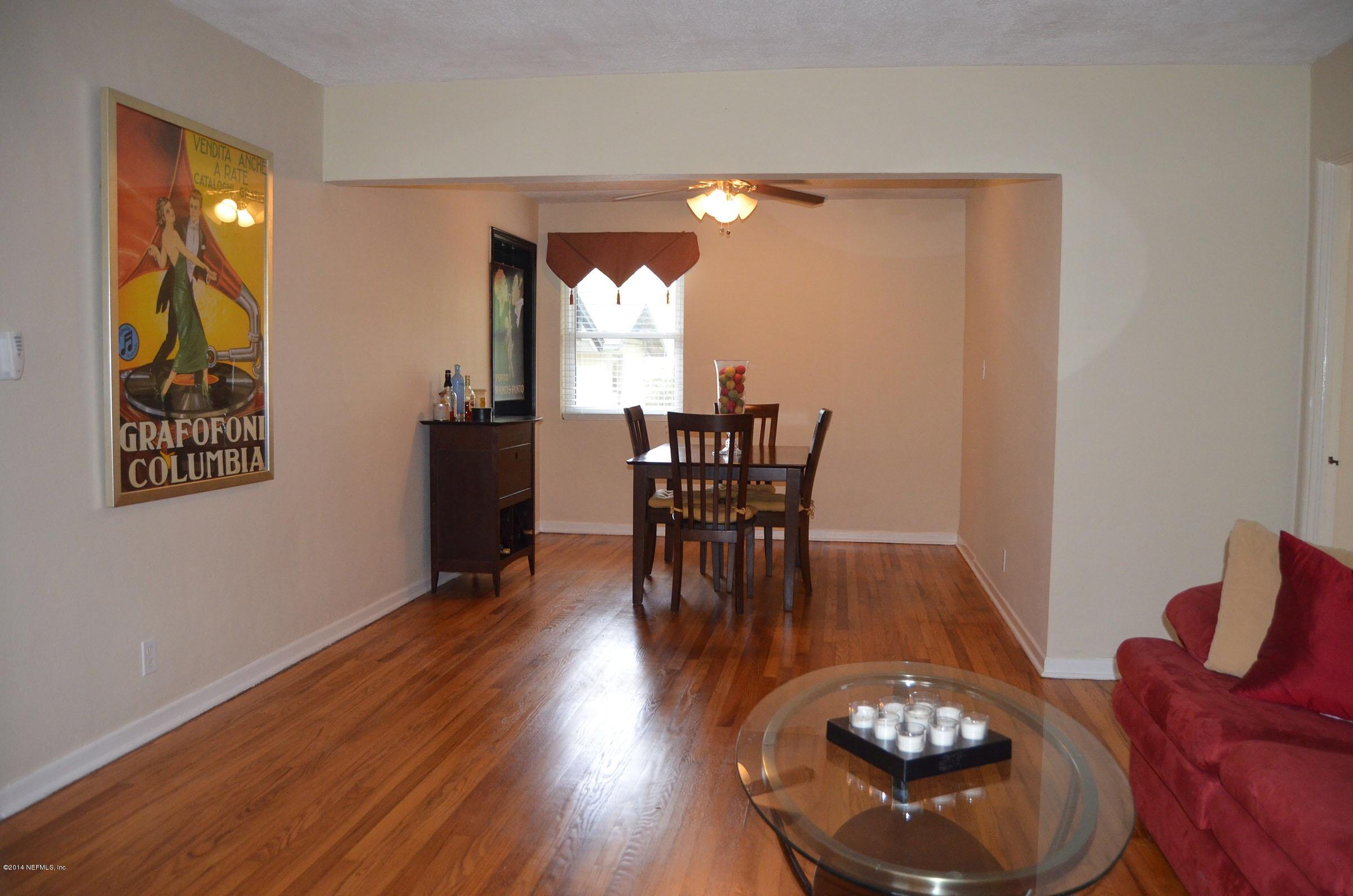 4676 Martingale Road Jacksonville, FL 32210 - Photo 3 of 10 Living room to dining room