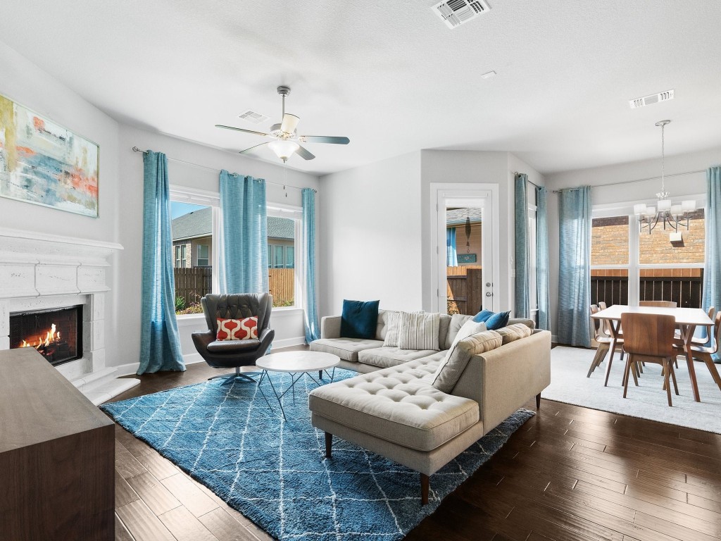a living room with furniture or couch and a fireplace