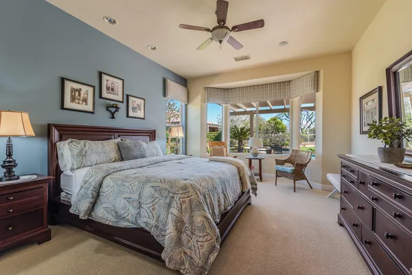 a bed room with a bed and a couch