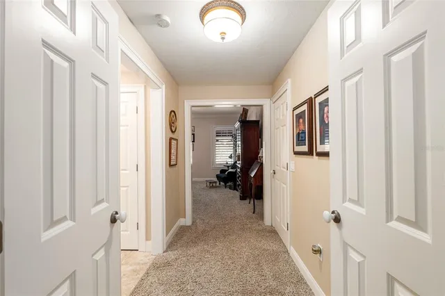 a spacious bedroom with a bed and a couch