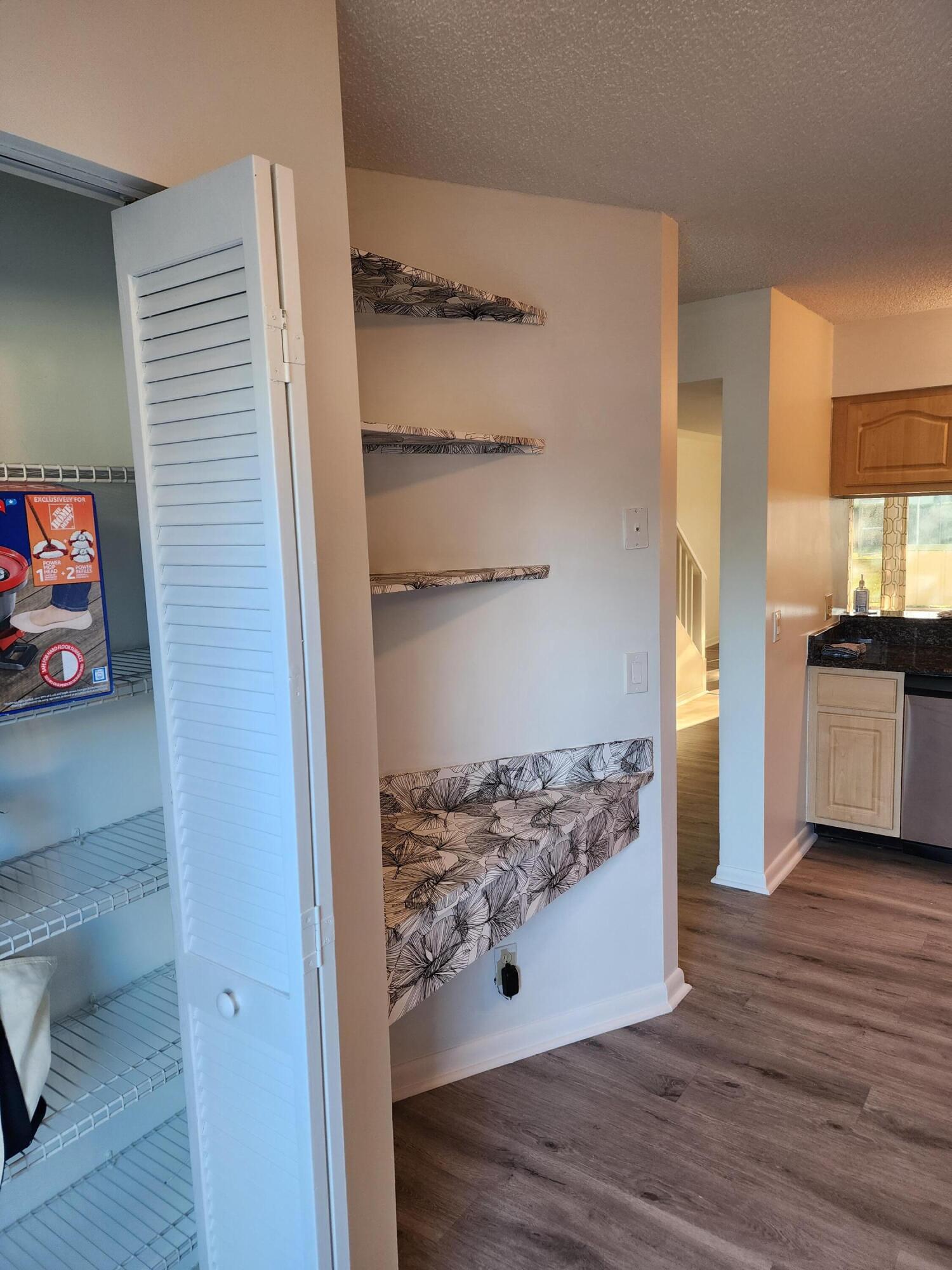 6263 Riverwalk Lane, Unit 2 Jupiter, FL 33458 - Photo 14 of 44 a view of kitchen with wooden floor