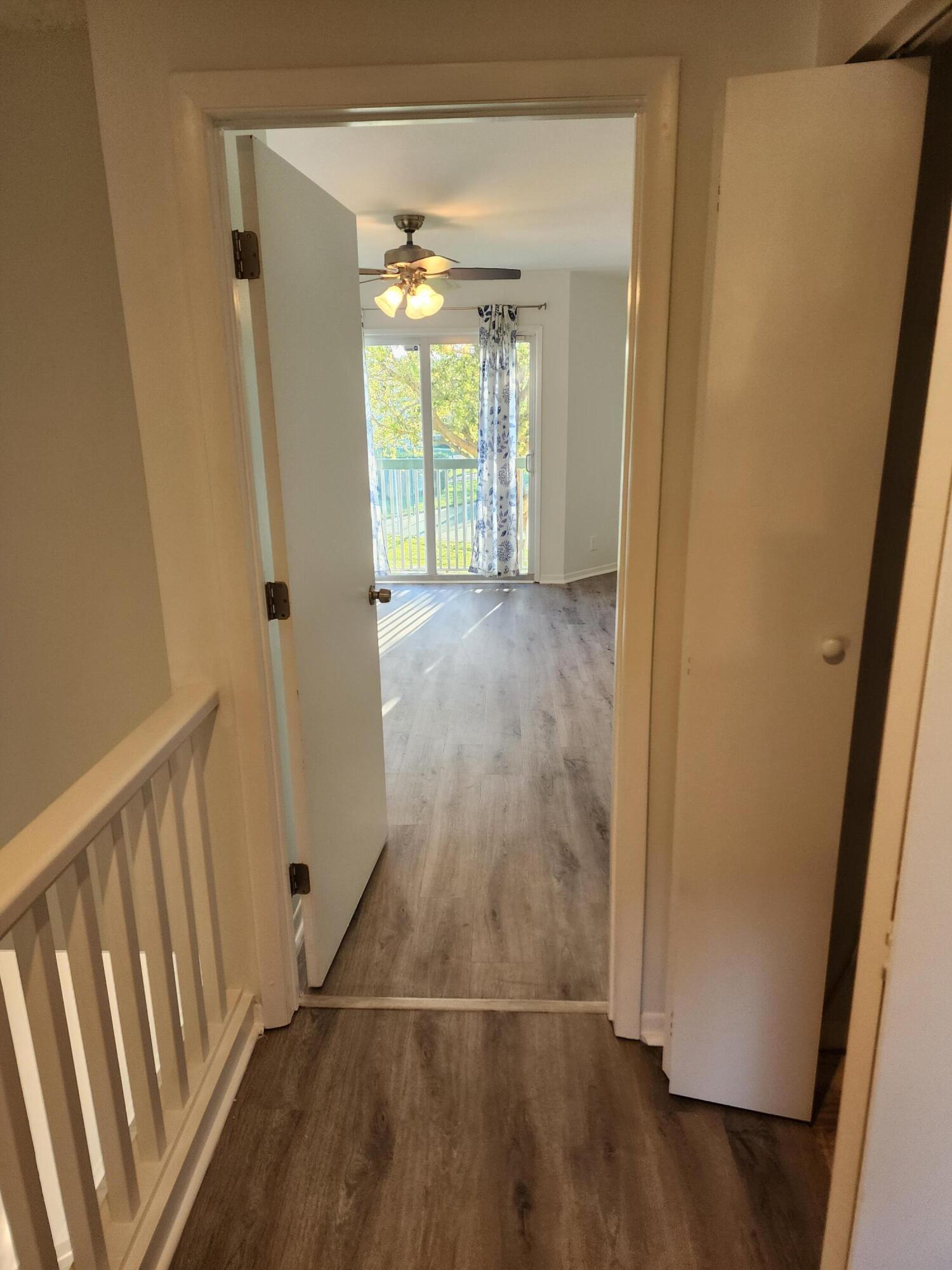 6263 Riverwalk Lane, Unit 2 Jupiter, FL 33458 - Photo 27 of 44 a view of a hallway