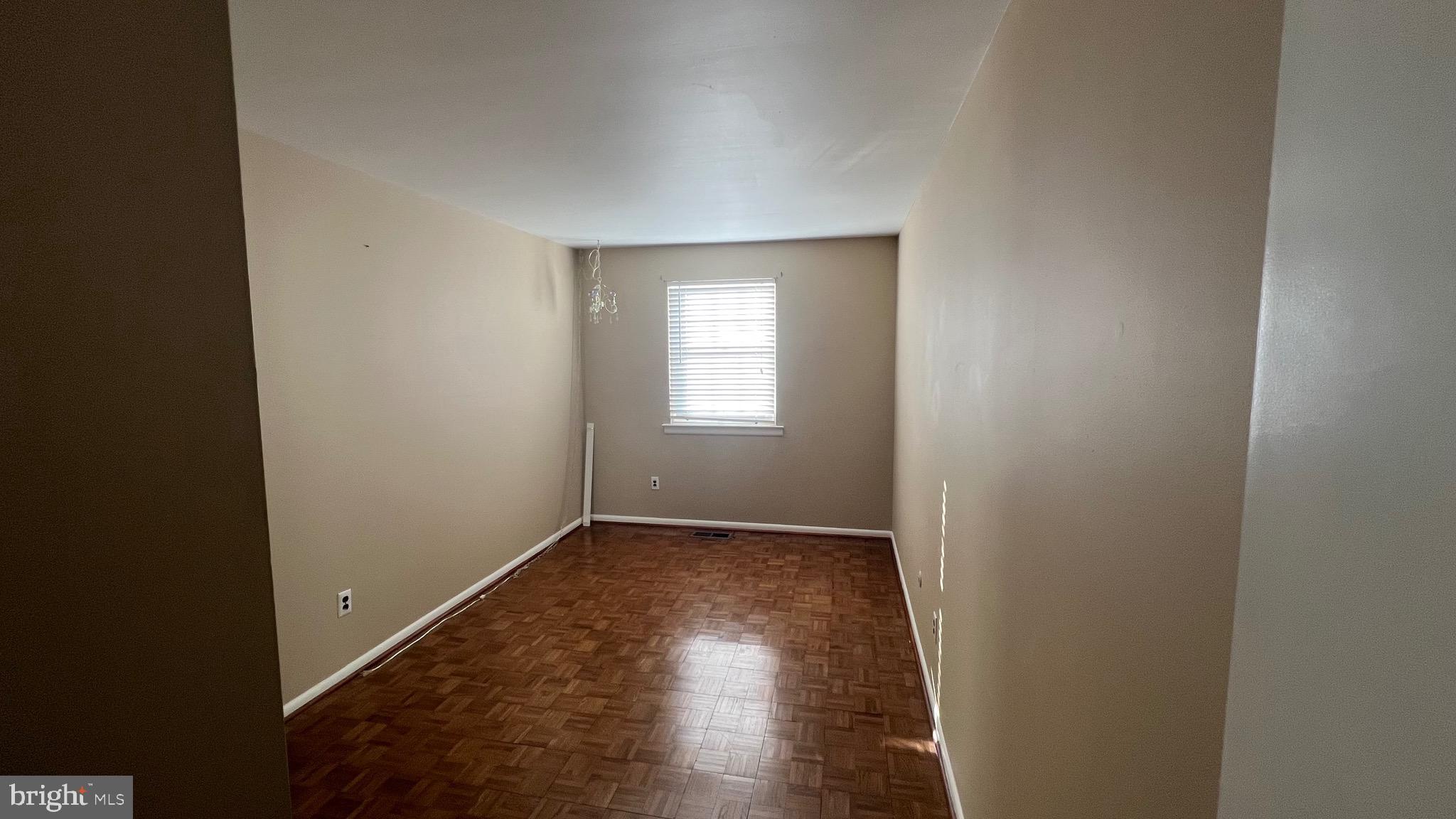 11023 Greiner Road Philadelphia, PA 19116 - Photo 13 of 29 an empty room with wooden floor and windows