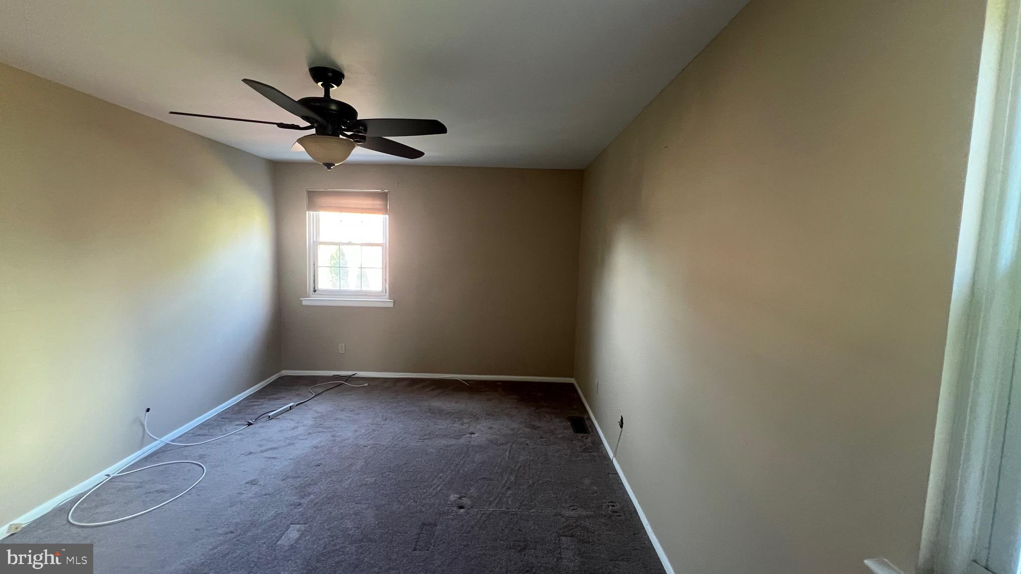 11023 Greiner Road Philadelphia, PA 19116 - Photo 16 of 29 a view of room window and a ceiling fan