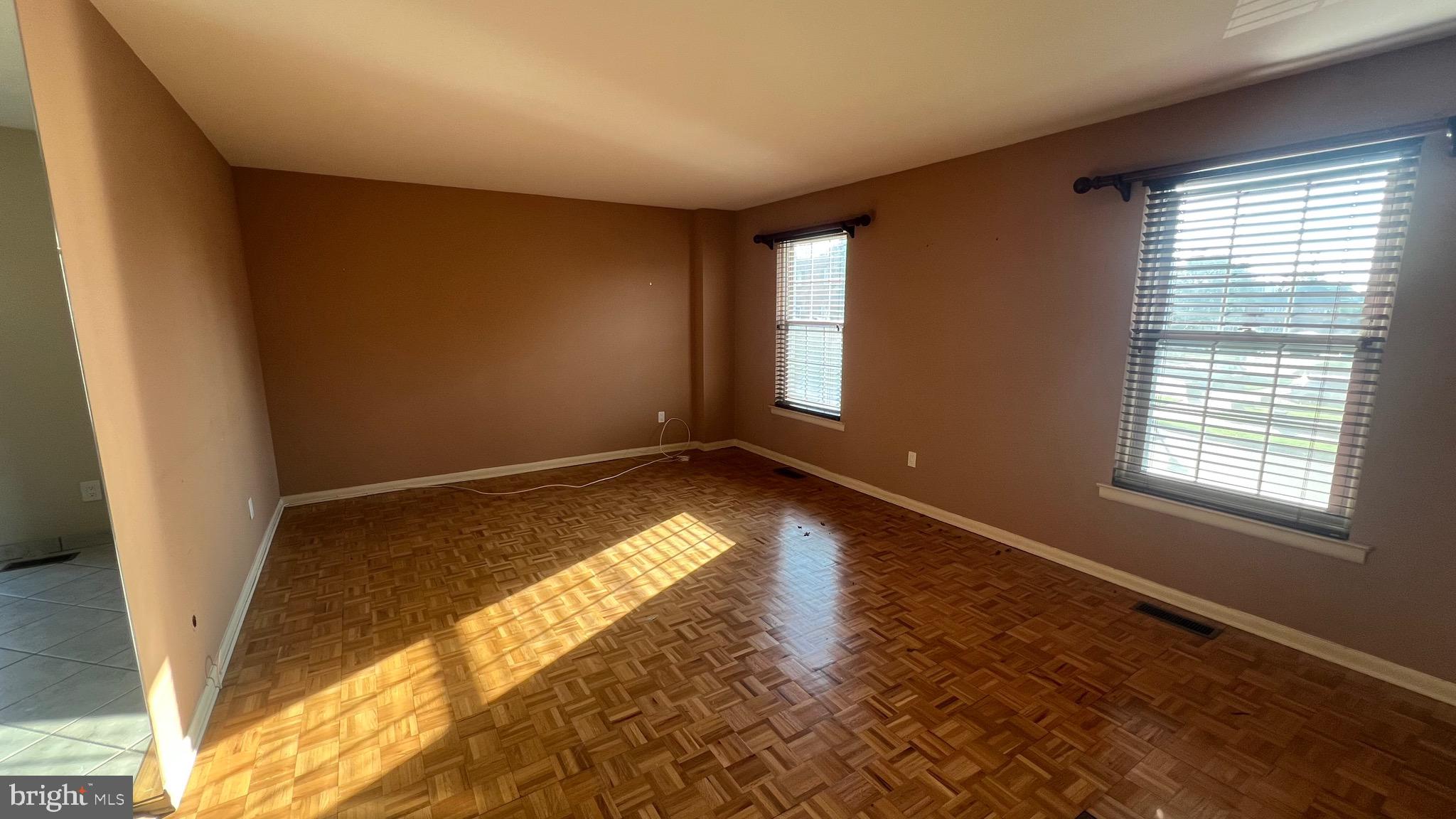 11023 Greiner Road Philadelphia, PA 19116 - Photo 2 of 29 a view of empty room with wooden floor and fan
