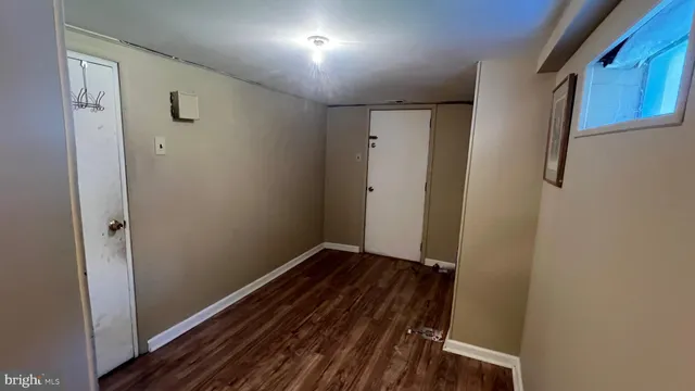 a view of small space with wooden floor