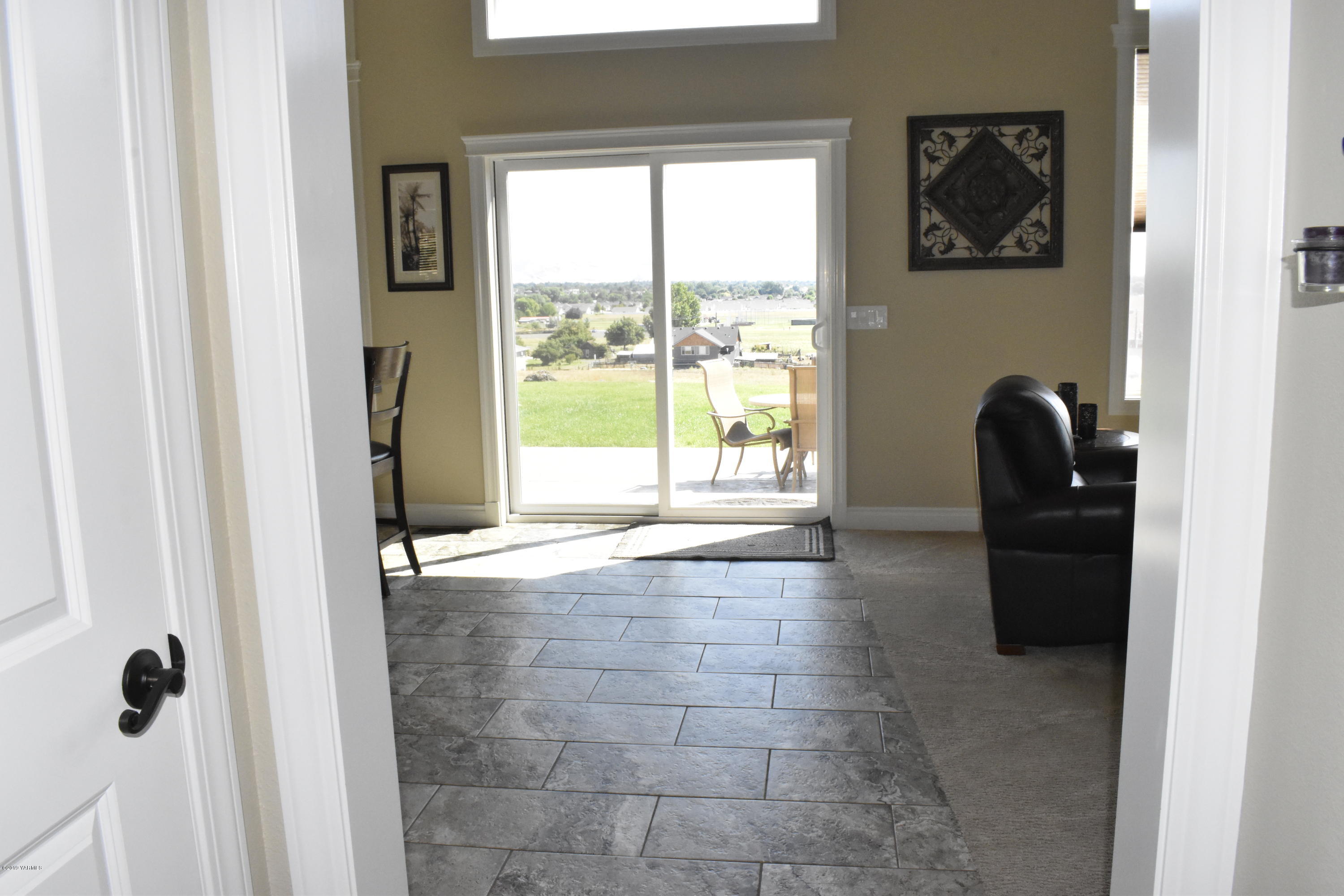 9709 Grunewald Road Yakima, WA 98908 - Photo 21 of 42 a view of a door and an empty room