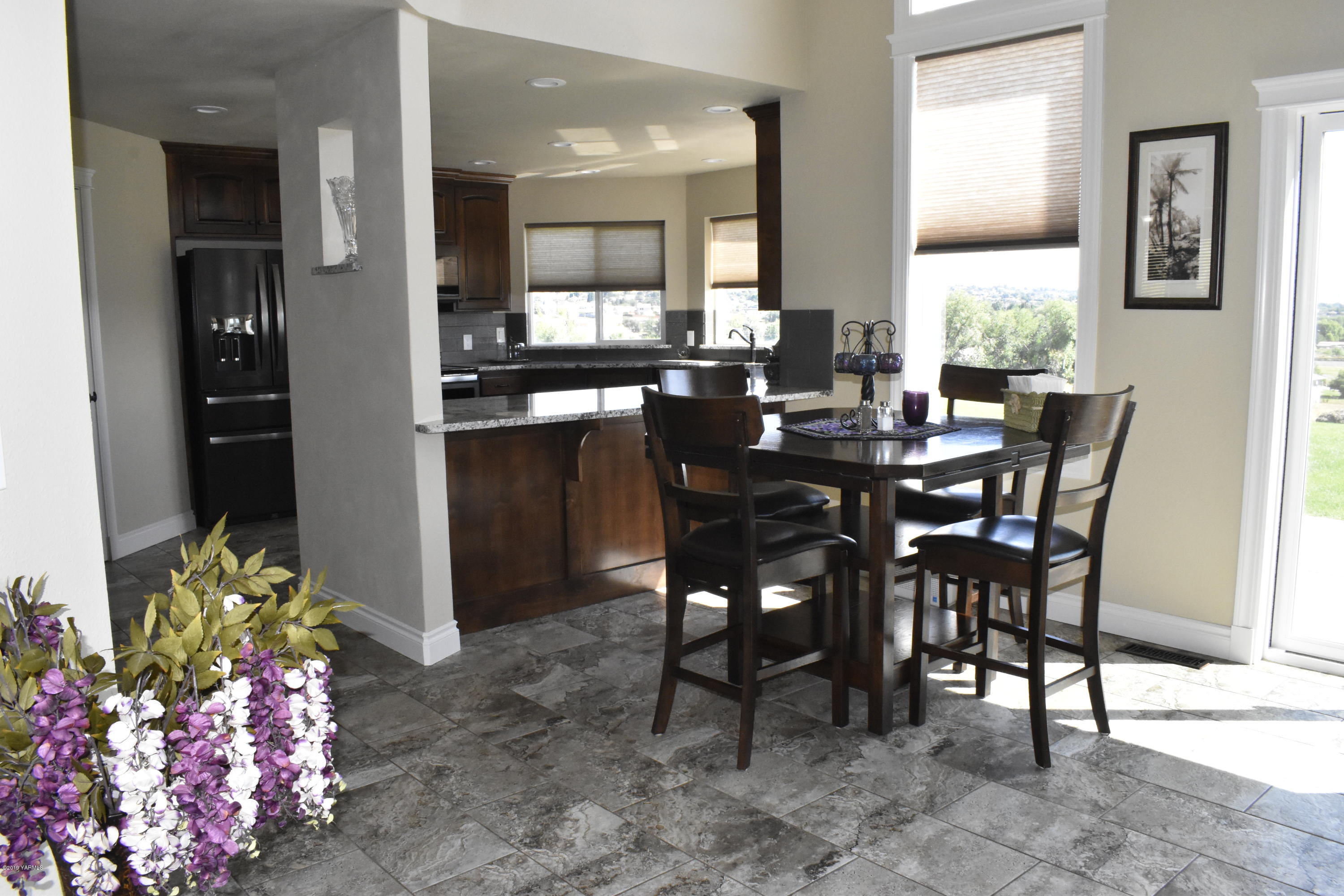9709 Grunewald Road Yakima, WA 98908 - Photo 23 of 42 a view of a dining room with furniture