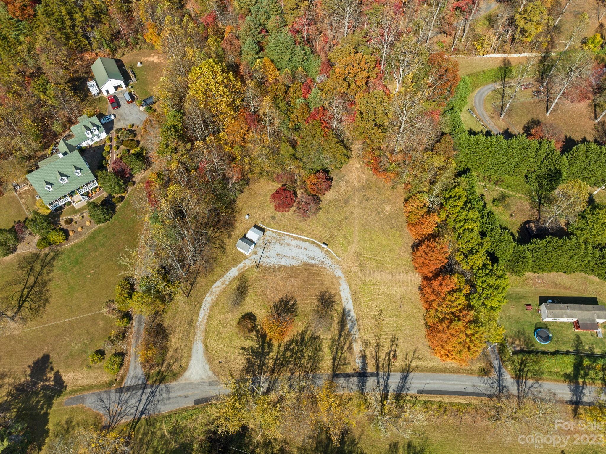 672 Mt Gilead Church Road Mills River, NC 28759 - Photo 13 of 29 an aerial view of a residential houses with yard