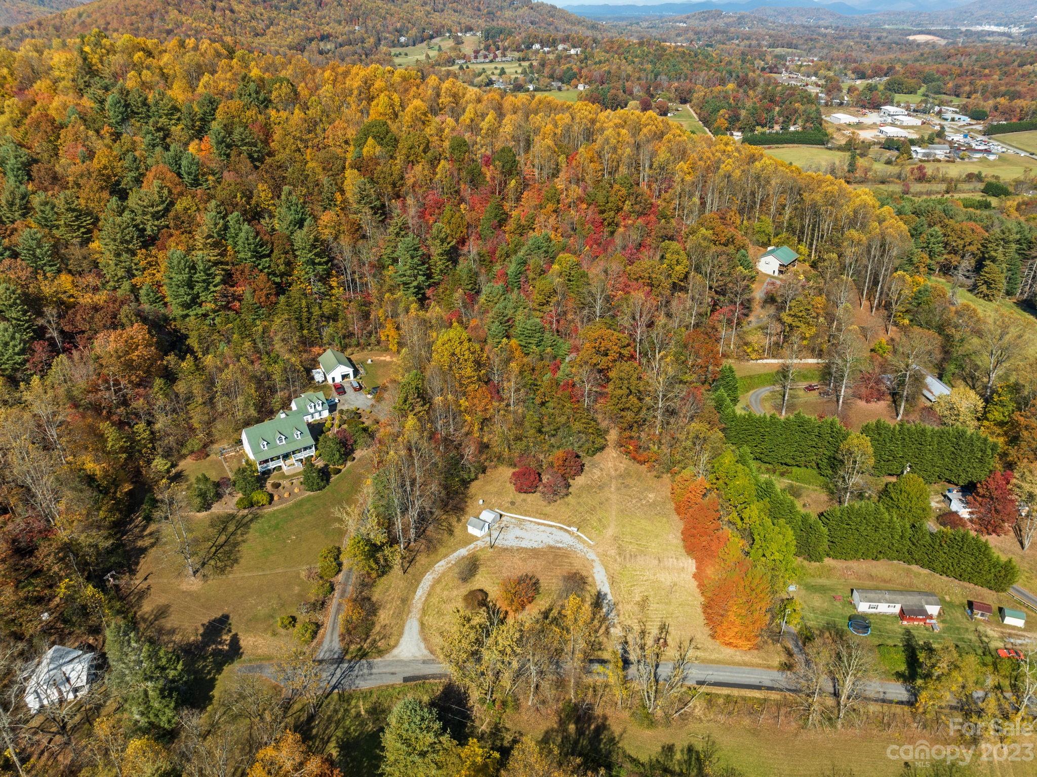 672 Mt Gilead Church Road Mills River, NC 28759 - Photo 14 of 29 an aerial view of residential houses with outdoor space