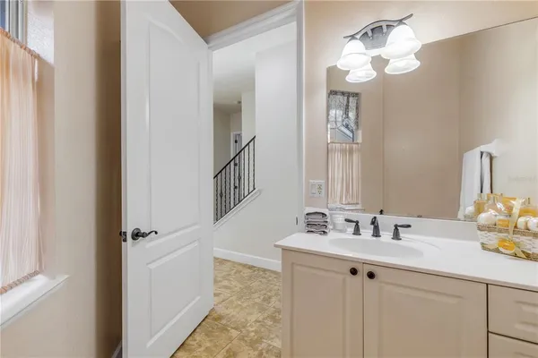 a bathroom with a toilet and a sink