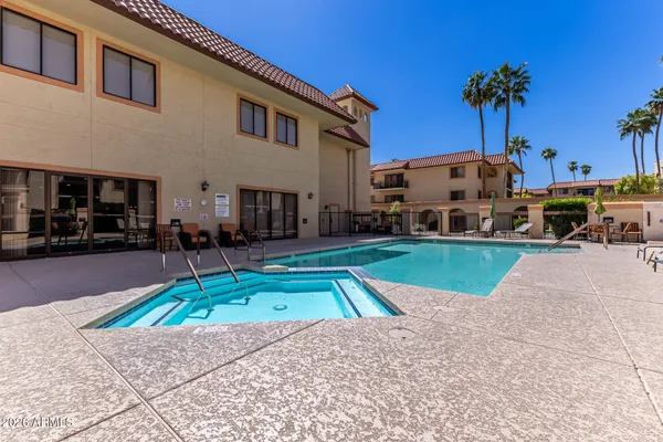 a view of a house with a swimming pool