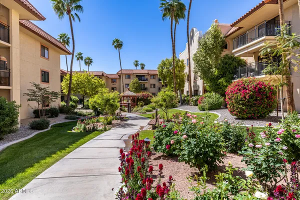 a view of a building with a yard