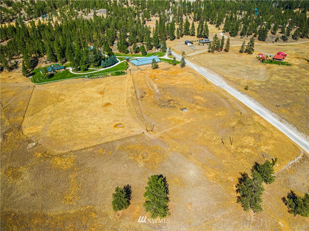39 Cape Labelle Road Tonasket, WA 98855 - Photo 25 of 39 a view of back yard of the house