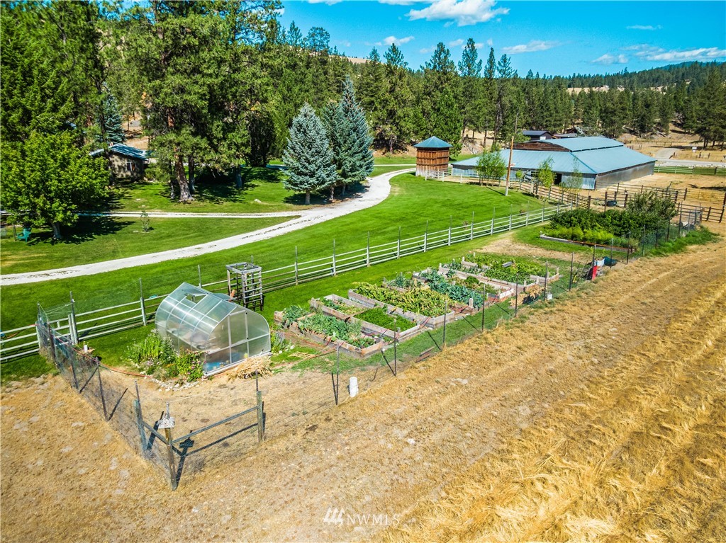 39 Cape Labelle Road Tonasket, WA 98855 - Photo 26 of 39 a view of a golf course with chairs