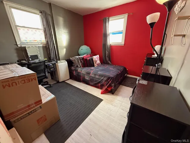 a bathroom with a sink toilet and mirror